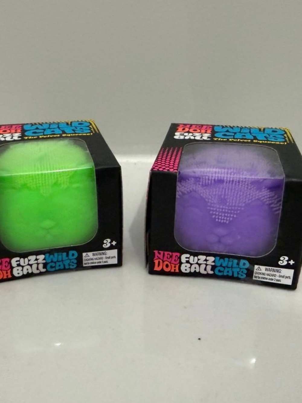 NEW 2X NEEDOH Fuzz Ball Wild Cats Sensory Toy - Green and Purple